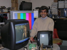 The owner servicing a television